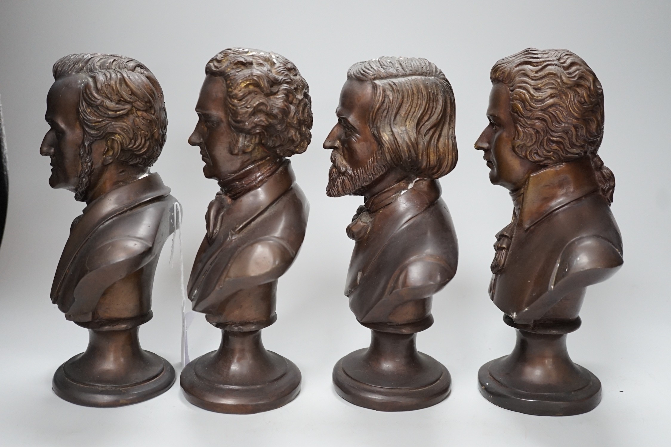 A set of four bronze busts of composers: Schubert, Wagner, Verdi and Mozart, 14cm high